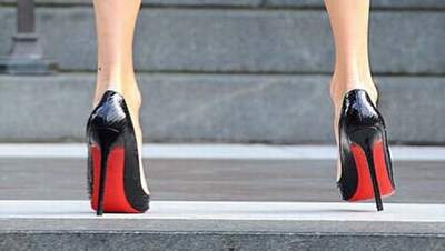nagui chaussures louboutin